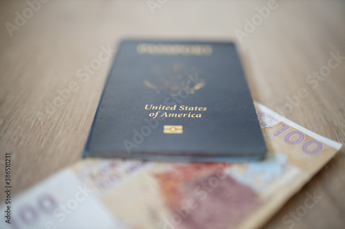 United States of America Passport with a 100 Moroccan Dirhams Bill Inside