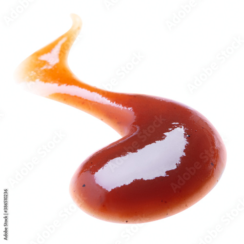 Smear of barbecue sauce or ketchup isolated on white background, close up.