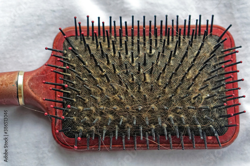 Dirty hairbrush