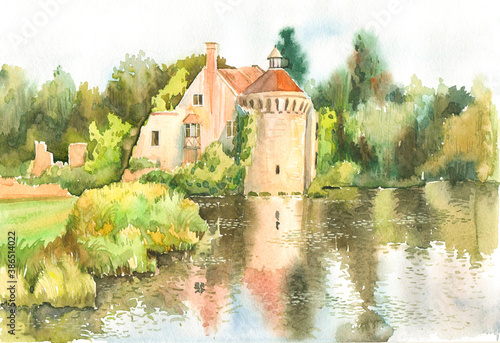 Old Skotney Castle, with its ivy tower, is reflected in the lake by the shore on a summer day. Drawing of the old castle of Scotney in watercolor on paper. England, Kent photo