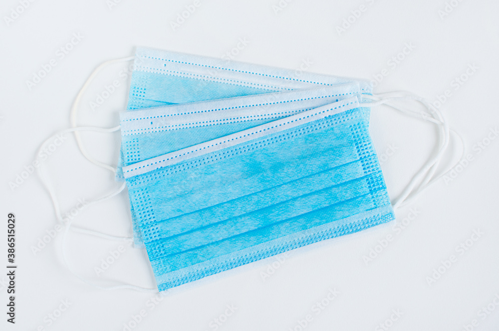 antiviral blue medical mask for protection against virus. Medical respiratory bandages antiviral blue medical mask for protection against virus. Medical respiratory bandages