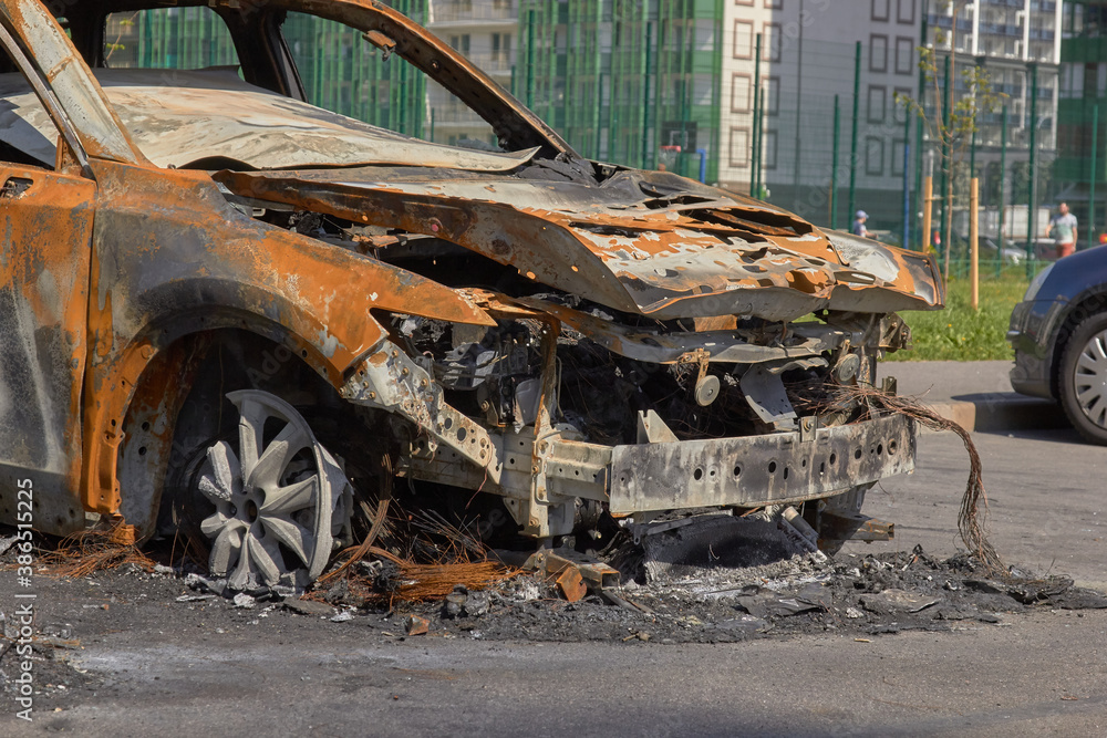Fototapeta premium city burned cars after a fire in one of the city's districts