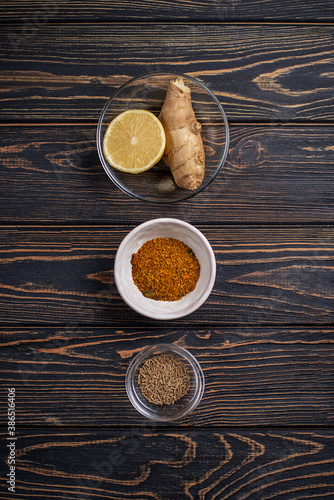 Traditional Indian, asian ingredients: spices for making curry, soup.Turmeric, lemon, ginger, cumin. 