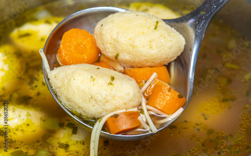 Semolina dumplings and carrots soup 