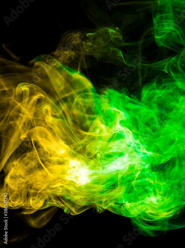 Colored smoke on black background