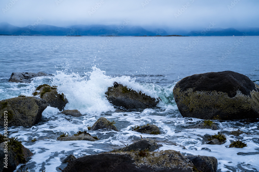 Ocean waves break at the beach Ocean waves break at the beach