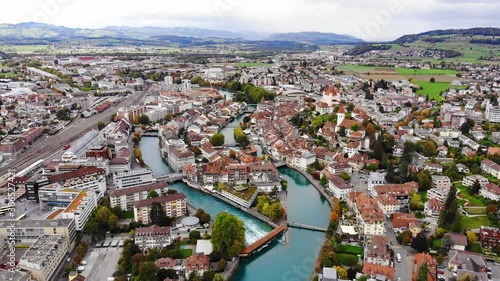 Aerial view over the city of Thun in Switzerland - amazing drone footage photo