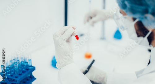 close up. scientists conduct research in the laboratory .
