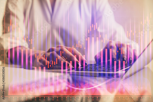 Double exposure of woman hands typing on computer and forex chart hologram drawing. Stock market invest concept. © peshkova