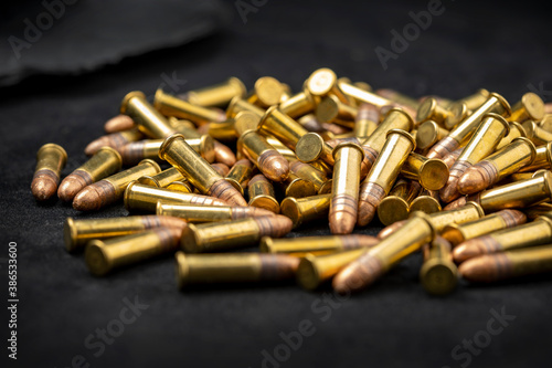Photo Close up of .22 ammunition on black background , .22 LR bullets