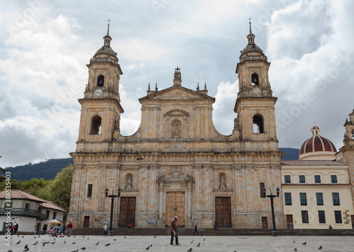 BOGOTA, COLOMBIA - Primatial Cathedral at bolivar square with cloudy sunny day at background