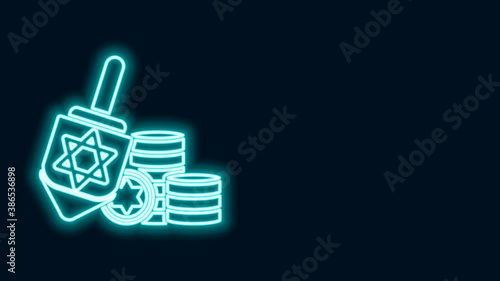 Glowing neon line Hanukkah dreidel and coin icon isolated on black background. 4K Video motion graphic animation