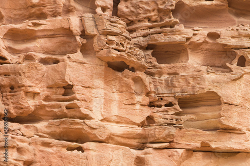 Natural texture of red rocks. Colored canyon, Egypt, the Sinai Peninsula.