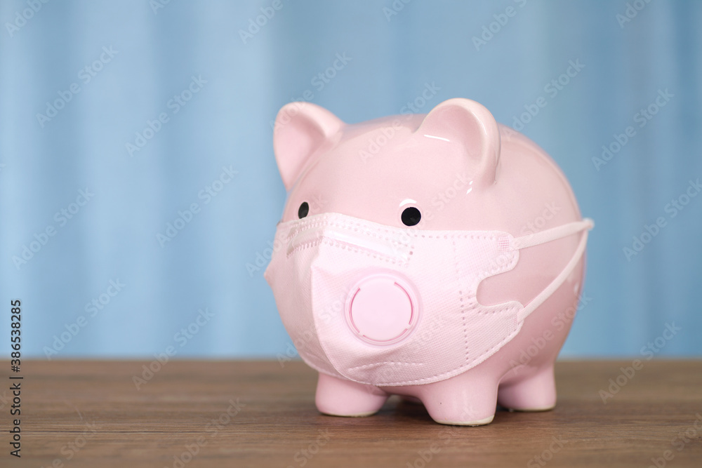 Piggy piggy bank wearing N95 mask