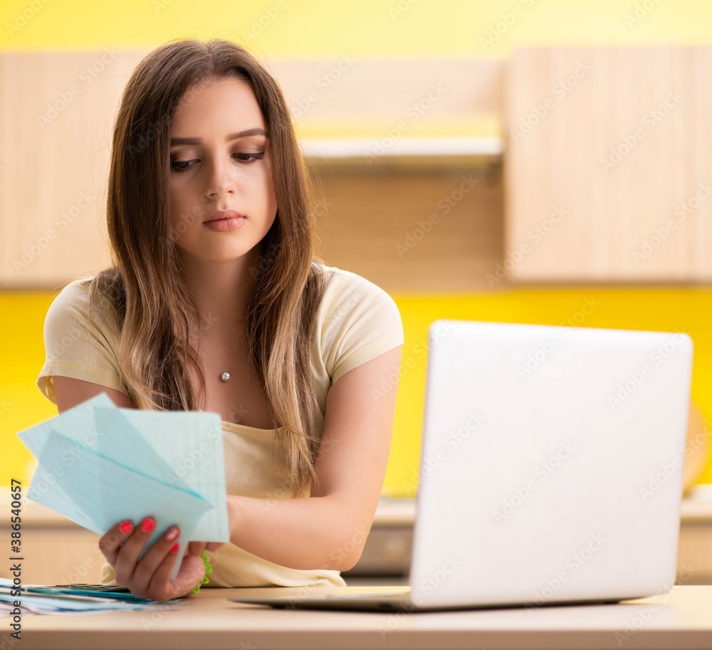 Young woman wife in budget planning concept Young woman wife in budget planning concept