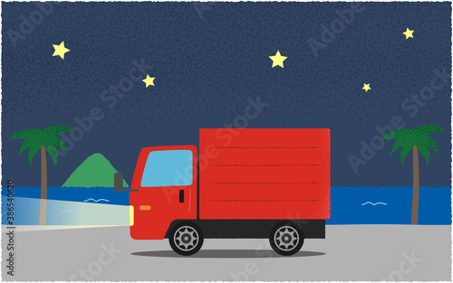 夜、ライトを点けて海沿いの道を進む赤いトラックのベクターイラスト