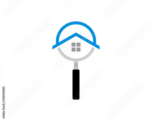 Magnifying glass with simple house inside