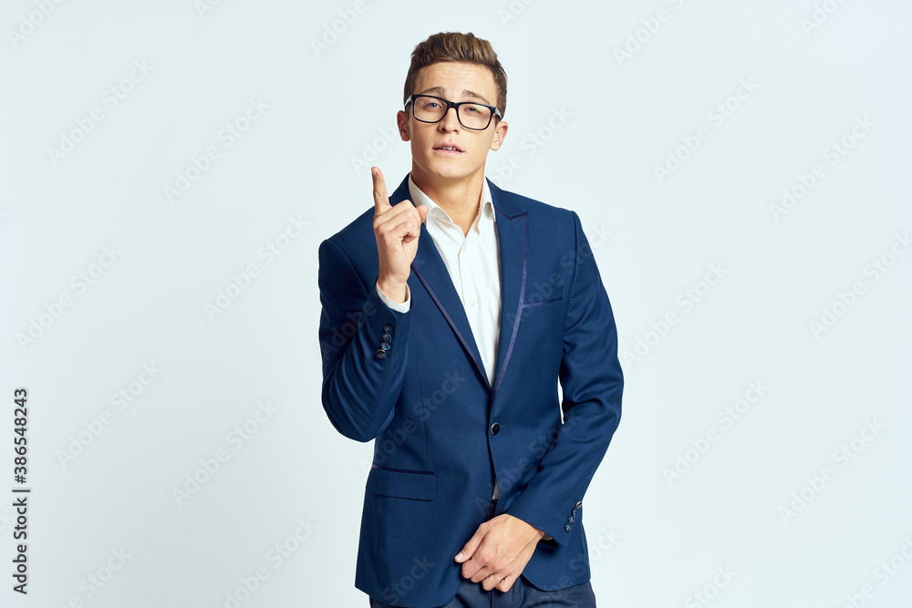 business man in suit wearing glasses self-confidence manager executive light background business man in suit wearing glasses self-confidence manager executive light background
