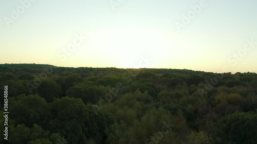 Sunrise horizon aerial view over Tolland county green forest woodland wilderness photo