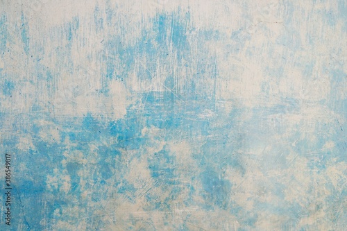 abstract background, white and blue brush stroke on concrete wall