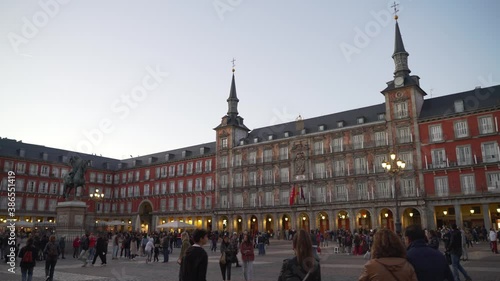 Plaza Mayor in Madrid in a daylight with crowded people before the state of alarm in Spain for COVID-19.