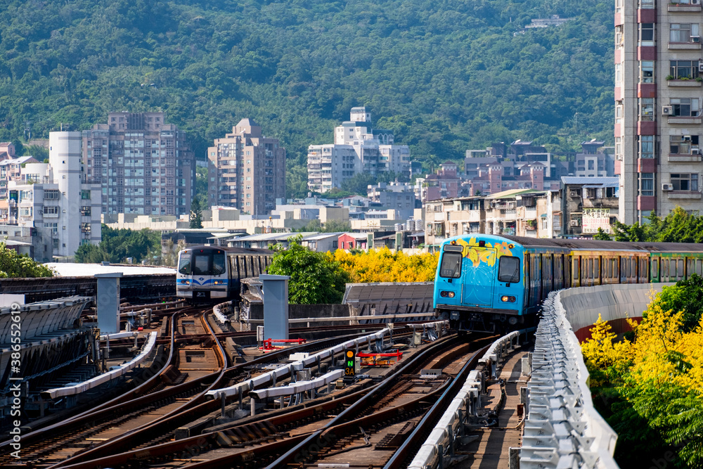 A beautiful colorful flower painted on train on railway. Beitou Train Station, Taipei, Taiwan. A beautiful colorful flower painted on train on railway. Beitou Train Station, Taipei, Taiwan.