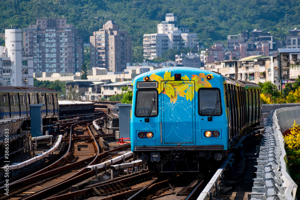 A beautiful colorful flower painted on train on railway. Beitou Train Station, Taipei, Taiwan. A beautiful colorful flower painted on train on railway. Beitou Train Station, Taipei, Taiwan.