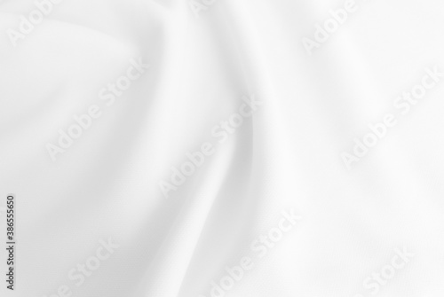 Rippled white cloth background. Fabric texture.