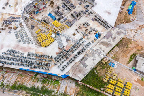 urban construction site with crane and building. industrial construction site background. aerial view