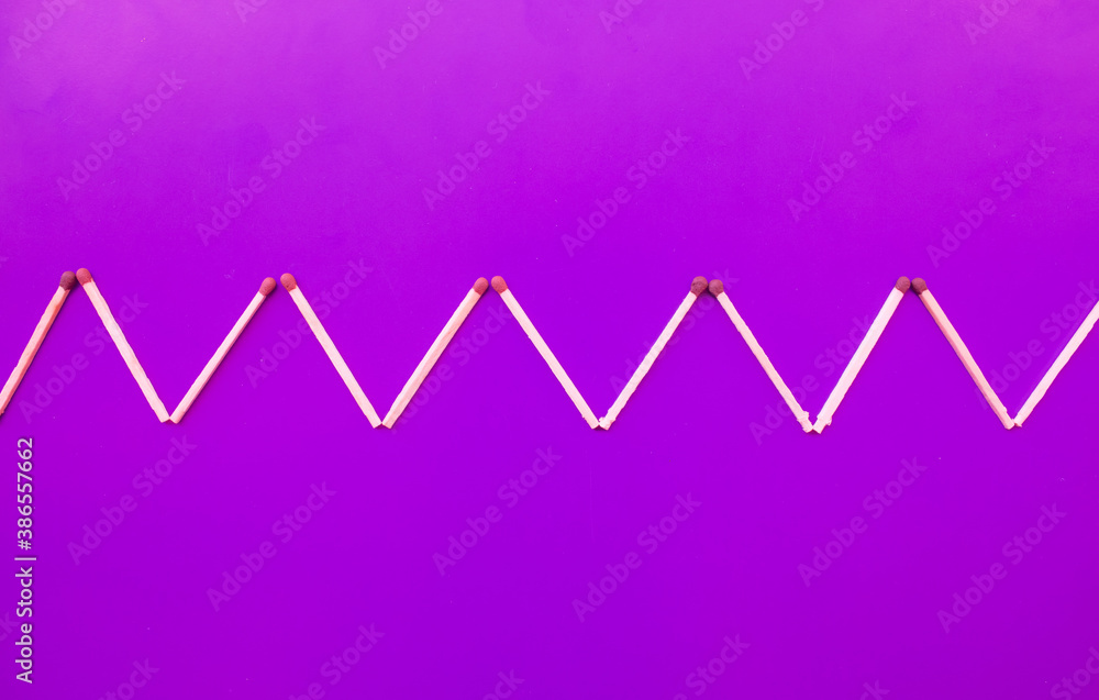 Conceptual figures from matches on a bright background. Downtime and minimal art object. Not like everyone else, different from the crowd Conceptual figures from matches on a bright background. Downtime and minimal art object. Not like everyone else, different from the crowd