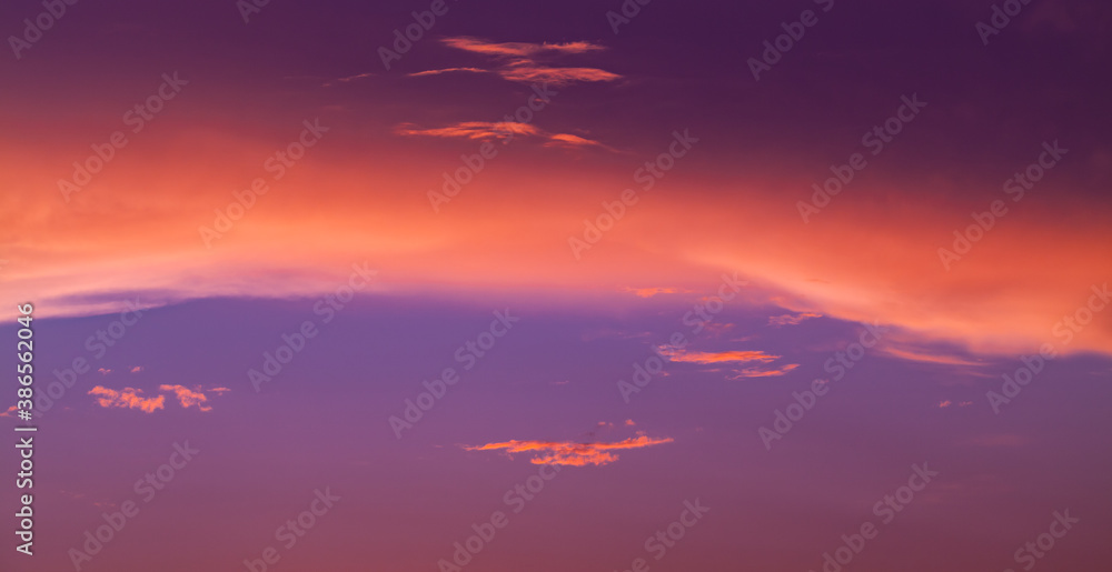 Colorful clouds are in tropical sky at sunset