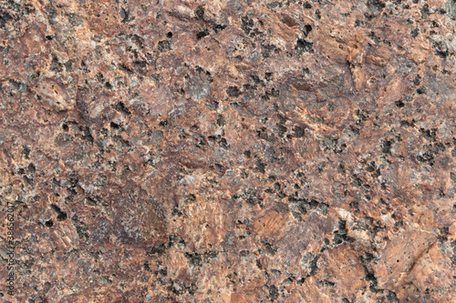 Natural red brown granite stone surface, background