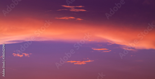 Colorful clouds are in tropical sky at sunset