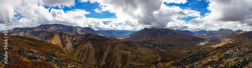 Panoramic View of Scenic Landscape and Mountains on a Cloudy Day in Canadian Nature. Aerial Shot. Taken in Tombstone Territorial Park, Yukon, Canada.