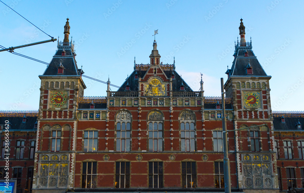 Amsterdam Central station against the blue sky.