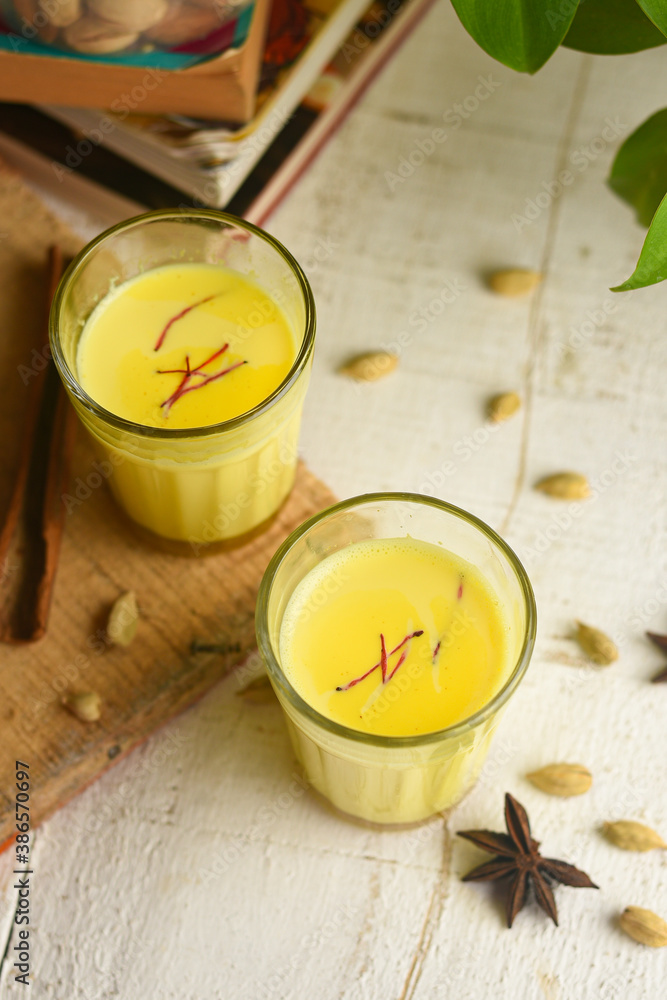 Turmeric milk Indian Ayurveda drink. Anti viral healthy Ayurvedic drink