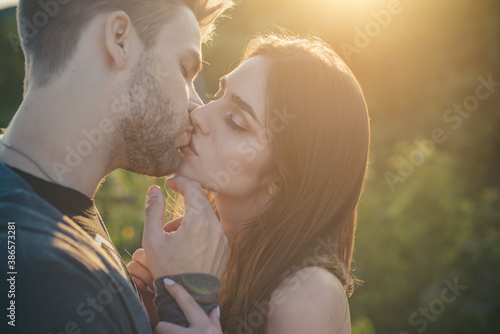 Romantic beautiful lovely couple of lovers kissing. Passion dating and love. photo