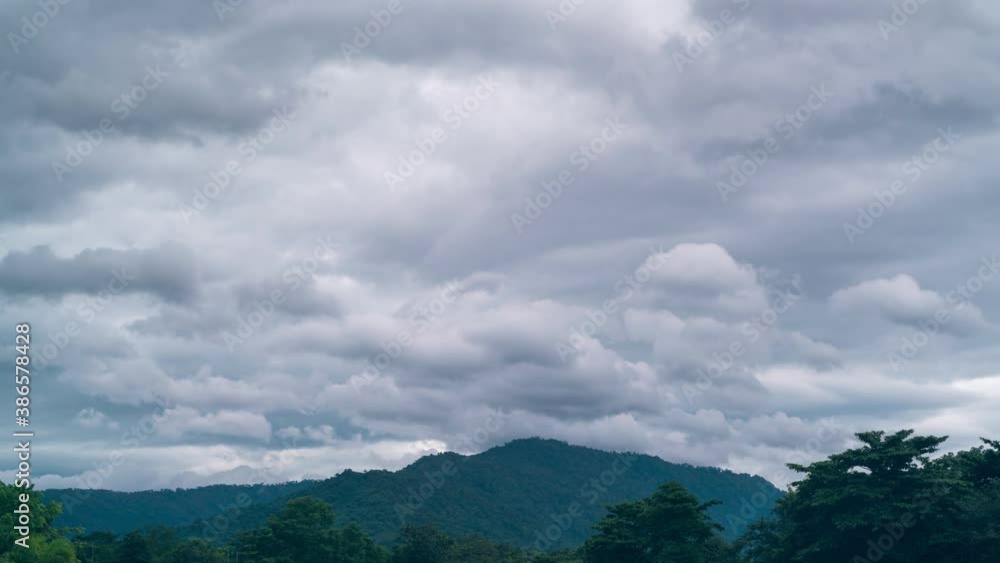 Time lapse sky and white clouds flowing over mountain Time lapse sky and white clouds flowing over mountain
