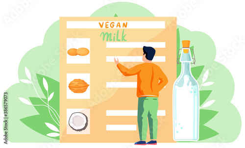 Vegan man looks at a menu with different types of plant-based milk and selects order. The guy adheres to a proper diet and a healthy lifestyle. Peanut, almond and coconut milk. Vegan concept