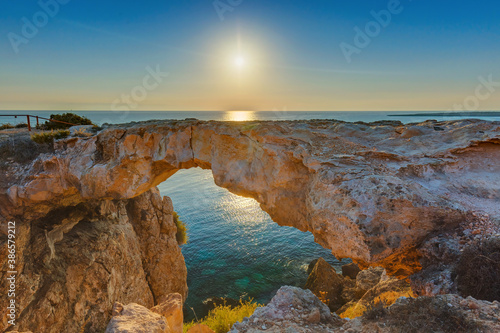 Famous stone Sin Bridge at sunrise in Ayia Napa Cyprus