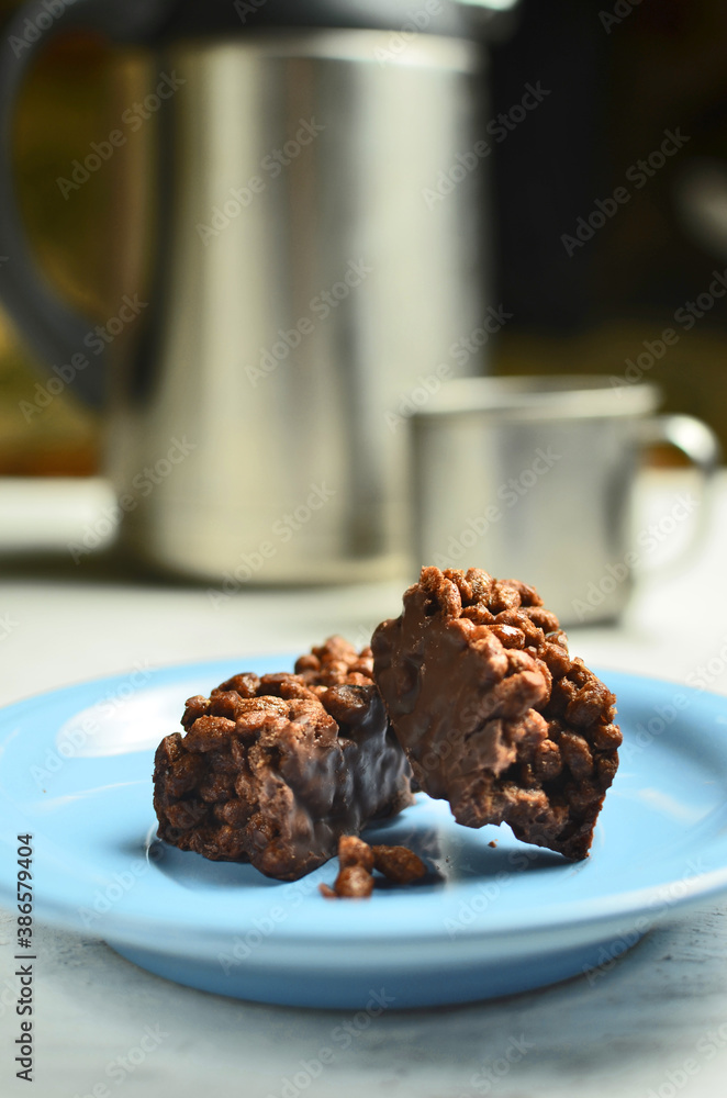 Chocolate bar on a plate with coffee Chocolate bar on a plate with coffee