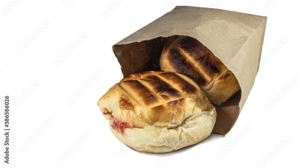 Round bun charcoal grilled serve with crispy bread skin, isolated on the white background. Round bun charcoal grilled serve with crispy bread skin, isolated on the white background.