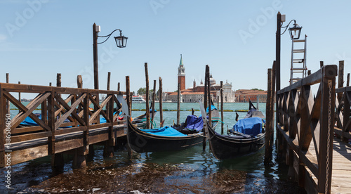 Venice with famous gondolas at day, Italy © alexxich