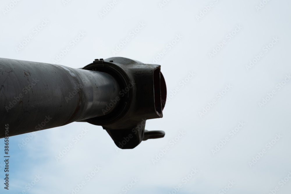 Muzzle of an artillery gun against the sky. Muzzle of the weapon. Stock ...