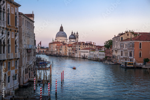 Grand Canal in Venice, with Santa Maria della Salute Basilica in the background. © alexxich