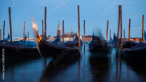 Gondolas in Venice night view from San Marco square in Italy.