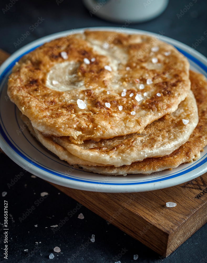 stack of pancakes with butter