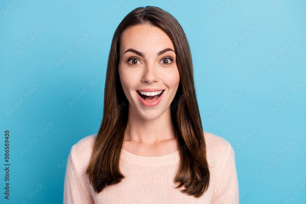 Fototapeta premium Portrait of astonished girl shout loudly wear winter pullover isolated over blue pastel color background