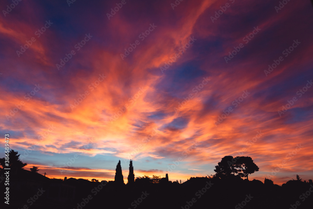 Panoramic view the blood red morning sky and amazing clouds.