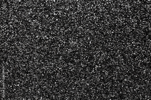 dark bitumen or asphalt background, tar grainy texture 